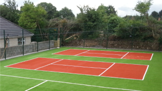 terracotta coloured artificial grass for basketball court