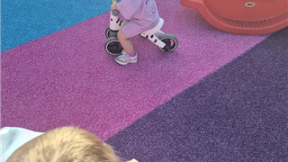 installation of groovy grass in nursery play area