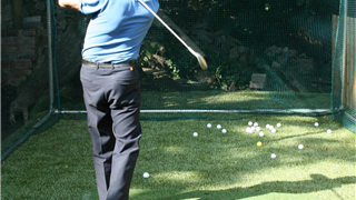 Mr McCracken practising his Golf Swing!