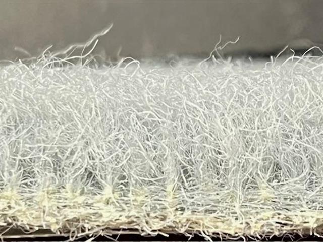 side view of platinum grey artificial grass