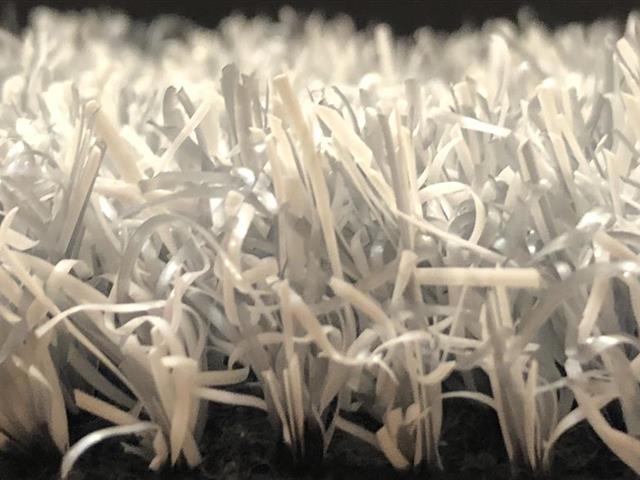 grey artificial grass side view