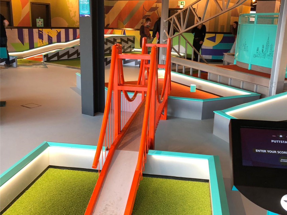 fun min golf course with green verde grass