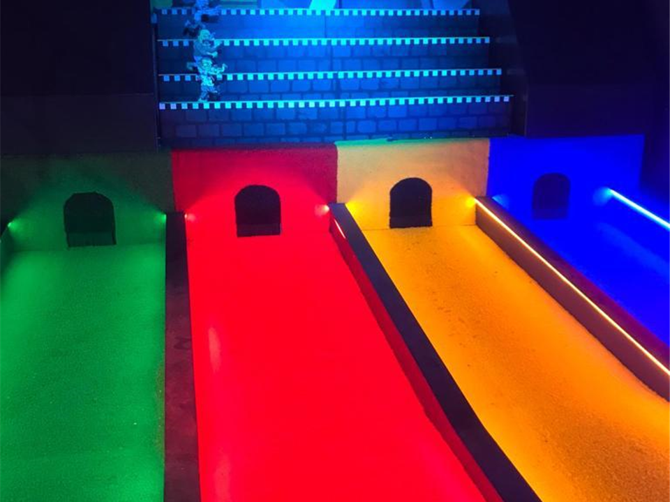 verde prime red lit up in a golf lane 