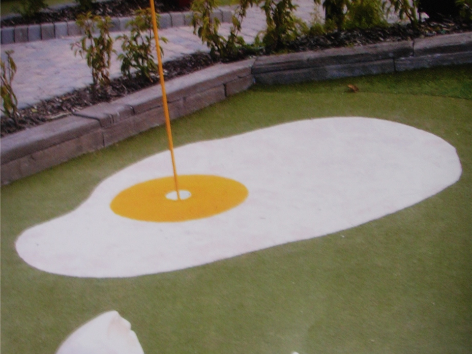 egg patterned mini golf made out of white verdeturf