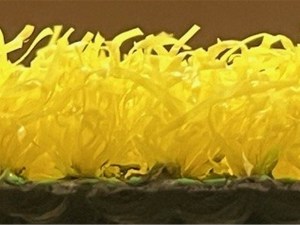 side view of yellow artificial grass
