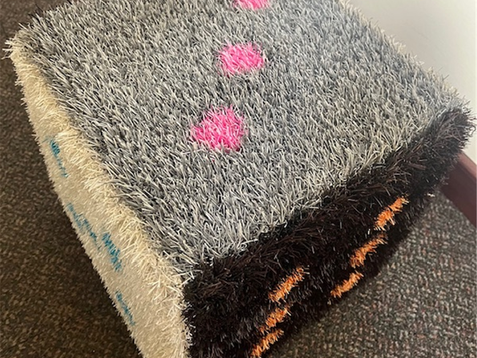 grey grass on artificial dice