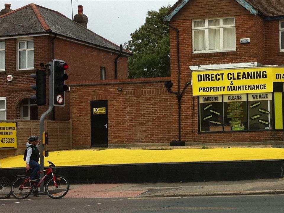 bright yellow artificial grass for outside shop front