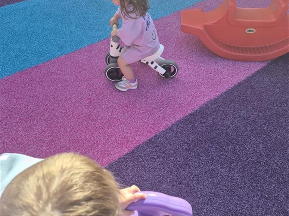 installation of groovy grass in nursery play area
