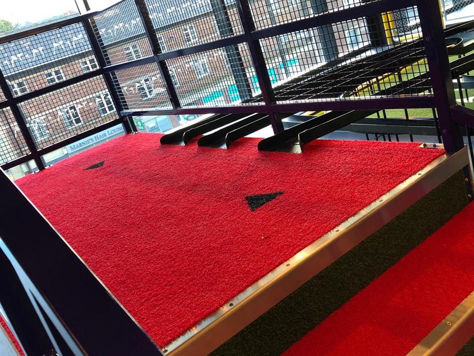 stairs in verde prime red artificial grass