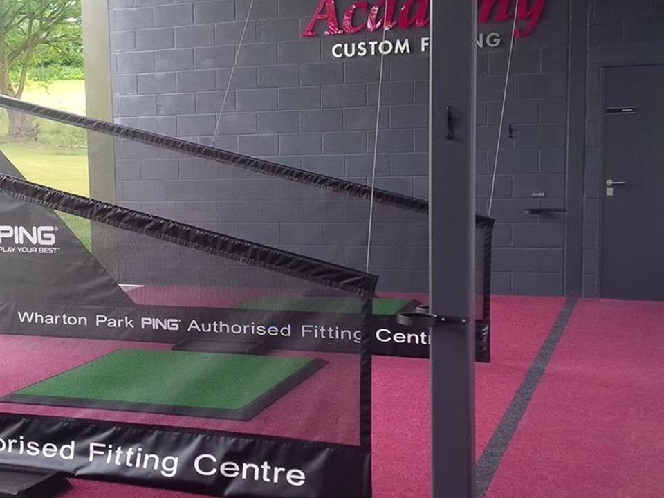 burgundy flooring for driving range