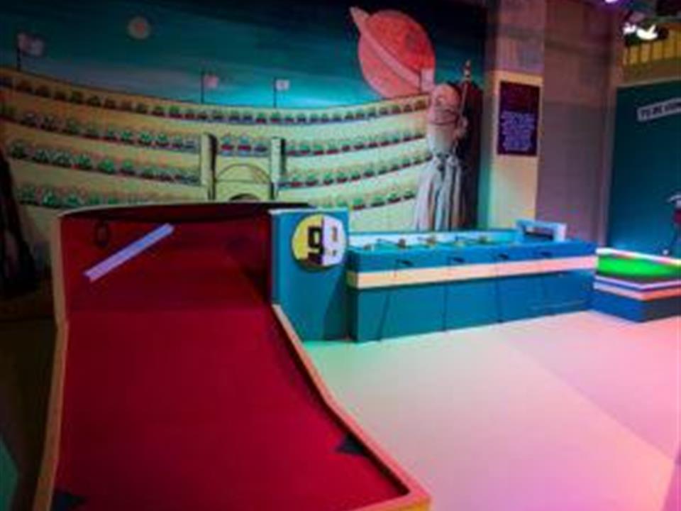 red artificial grass golfing ramp